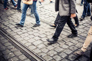 People walking on cobblestone